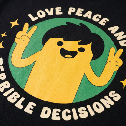 Close-up of cartoon peace sign character print on black oversized t-shirt