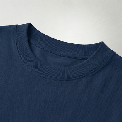 Close-up of navy blue oversized t-shirt ribbed cotton neckline