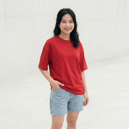 Woman wearing red oversized t-shirt front view relaxed fit minimal casual style