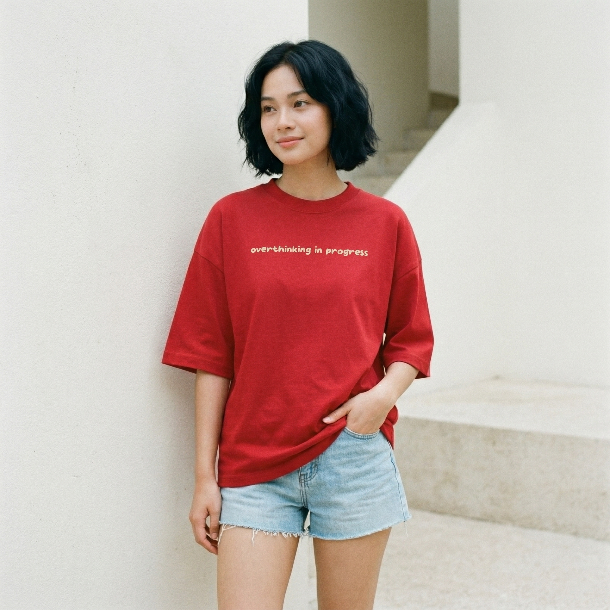 Woman wearing red oversized t-shirt relaxed fit casual everyday look