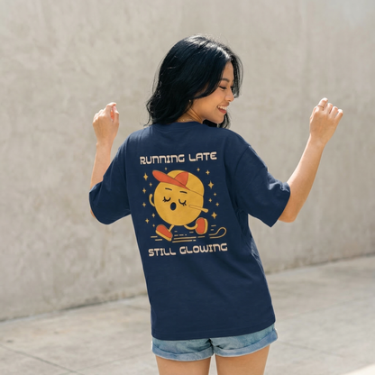 Woman wearing navy oversized t-shirt with running cartoon character back design